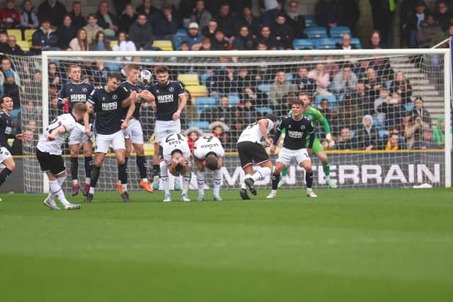 A close-up of the wall as Tommy Doyle of Sheffield United scores from a free kick to make it 1-1 during the Sky Bet Championship between Millwall and Sheffield United at The Den: Andrew Redington/Getty Images