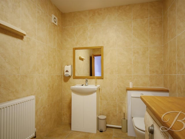 The basement also boasts a bathroom.