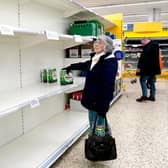 Shelves have been left bare because of panic buying across the UK. Photo: Morgan Harlow/PA Wire