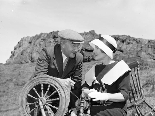 The film 'The Battle of the Sexes' was filmed in Edinburgh in 1959, with Arthur's Seat doubling as the Western Isles. Stars Peter Sellers and Constance Cummings are pictured with a spinning wheel in Holyrood Park.