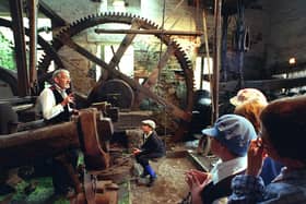 Tom Sharp telling schoolchildren about the tilt hammer at Abbeydale Industrial Hamlet, Sheffield in 2005
