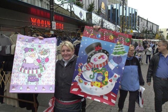 In 2002 there was a Christmas market in the town centre. Naomi Crisp sold festive cards at the event.