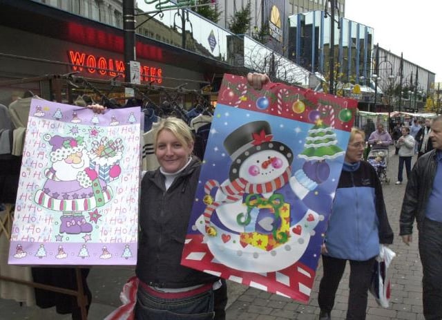 In 2002 there was a Christmas market in the town centre. Naomi Crisp sold festive cards at the event.