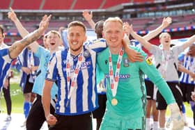 Sheffield Wednesday's Will Vaulks (left) and goalkeeper Cameron Dawson celebrates victory and promotion to the Sky Bet Championship following victory in the Sky Bet League One play-off final at Wembley Stadium, London. Picture date: Monday May 29, 2023. PA Photo. See PA story SOCCER Final. Photo credit should read: Nick Potts/PA Wire.