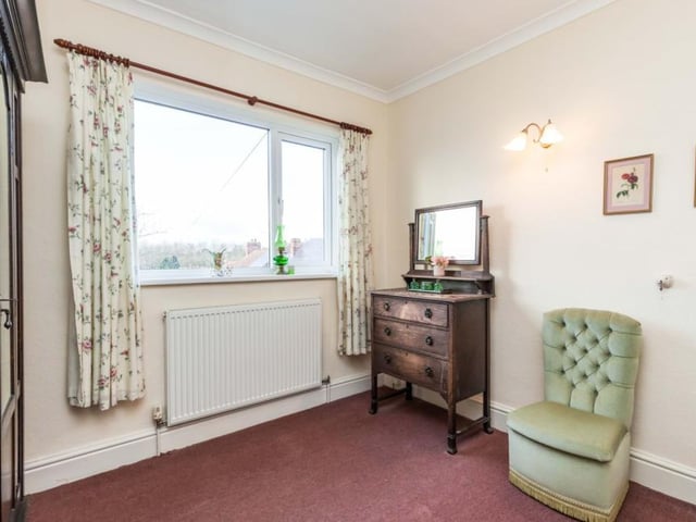 The second bedroom, which looks out on to the back of the house, is smaller than the main one but still a nice space.