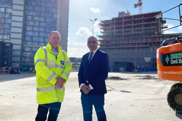 Councillor Mazher Iqbal, executive member for regeneration, and Tony Shaw, of Henry Boot Construction, at the site of Pounds Park in Sheffield city centre.