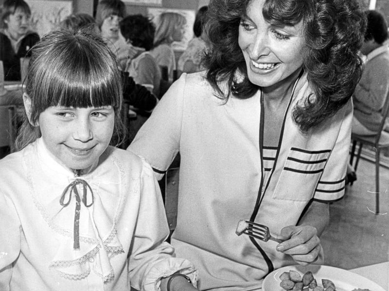 Marti Caine was invited for lunch at Lowedges Junior School, Sheffield, by Tina Wild (left), May 28, 1982