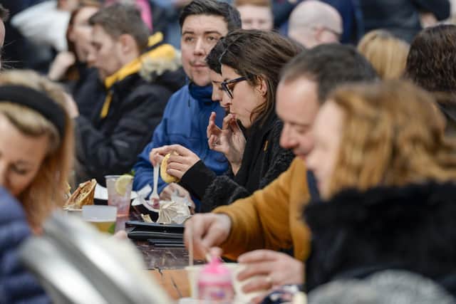 Visitors enjoy the food and drink on offer at Peddlers Market in Kelham Island - Sheffield City Council hope to work with them on creating mini street food markets in the city centre