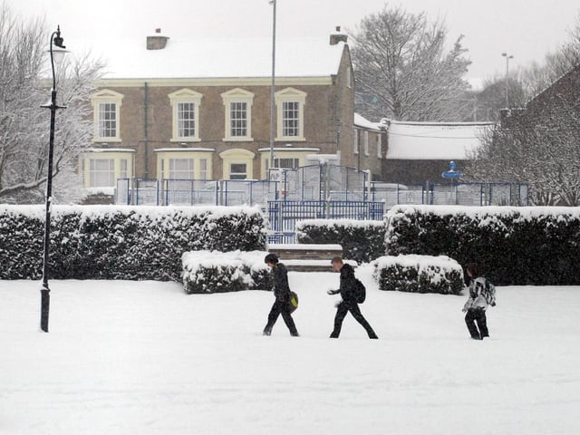 Three youngsters in the snow