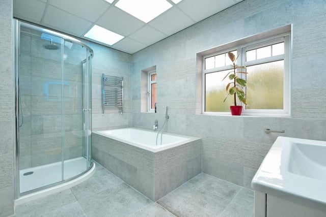 The family bathroom offers a large space to unwind in at the end of a busy day.