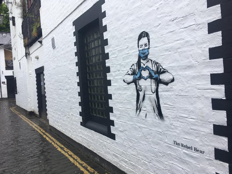 Street artist Rebel Bear's work appeared in Glasgow's Ashton Lane.
