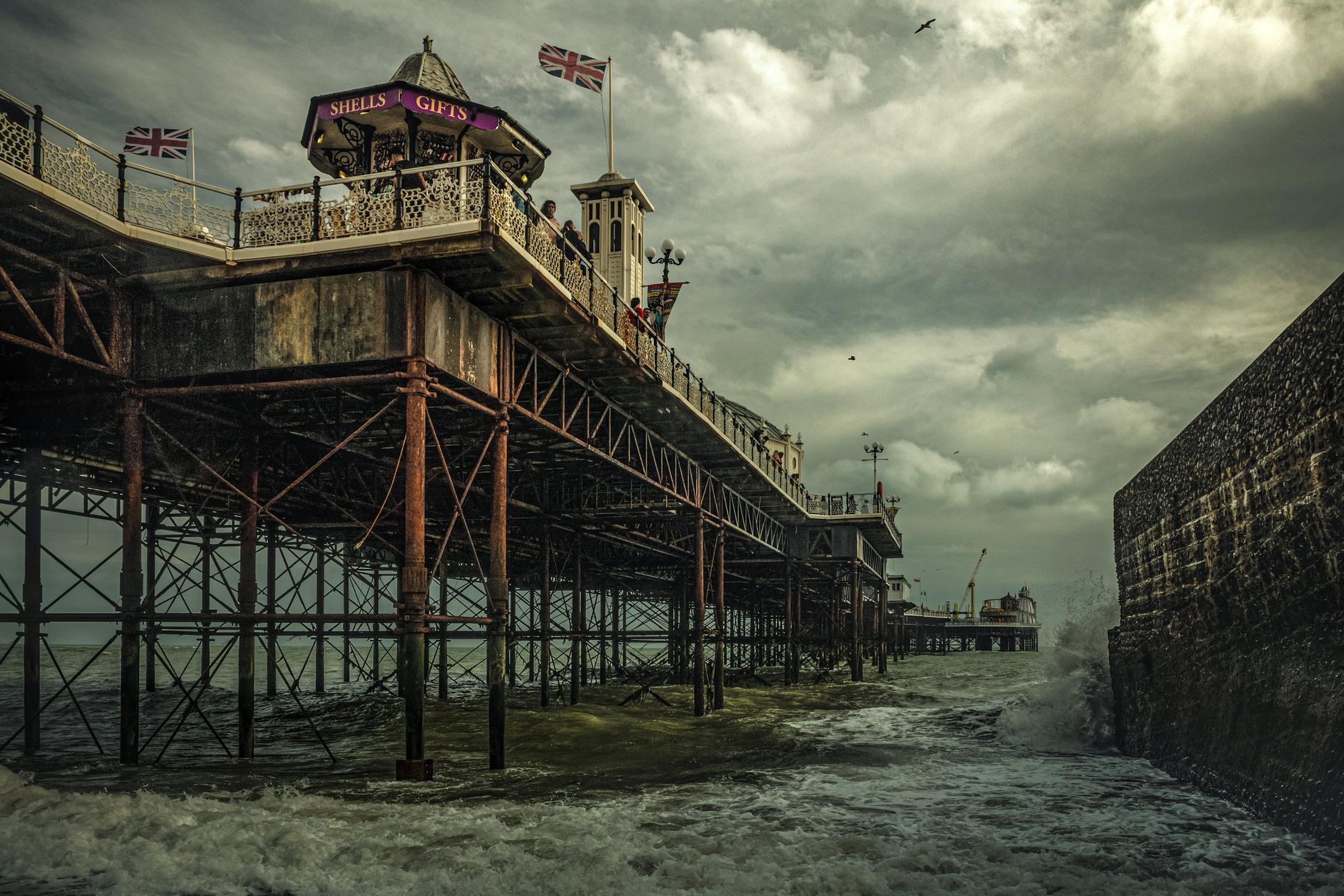 Overall Winner - Michael Marsh - The Brighton Palace Pier. 
Skydivers over the Great Pyramids of Giza and a Welsh farmhouse are just some of the astonishing pictures from the 2020 Historic Photographer of the Year Awards. The awards called on photographers to capture â€œhistory all around usâ€, in the form of historical places and cultural sites around the world. Astonishing images of civilisationâ€™s most iconic landmarks, including the Taj Mahal, Pompeii and the Palace of Versailles are just some of the historical sites featured. But the Overall Winner out of thousands of entries in the worldwide competition was awarded to Michael Marsh, for his sombre picture of Brighton Palace Pier, captioned  â€œstanding in the full force of weather and timeâ€.