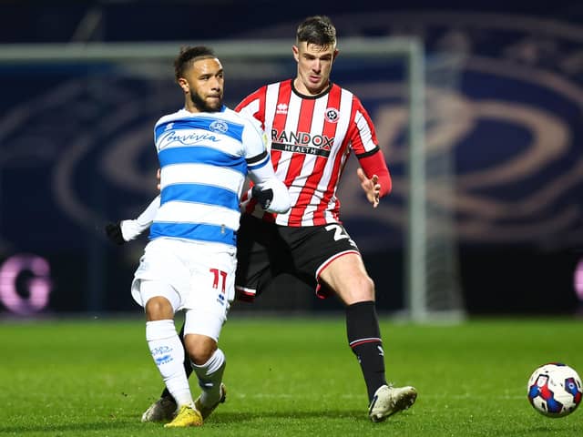 Tyler Roberts of QPR is closed down by Ciaran Clark of Sheffield United: David Klein / Sportimage