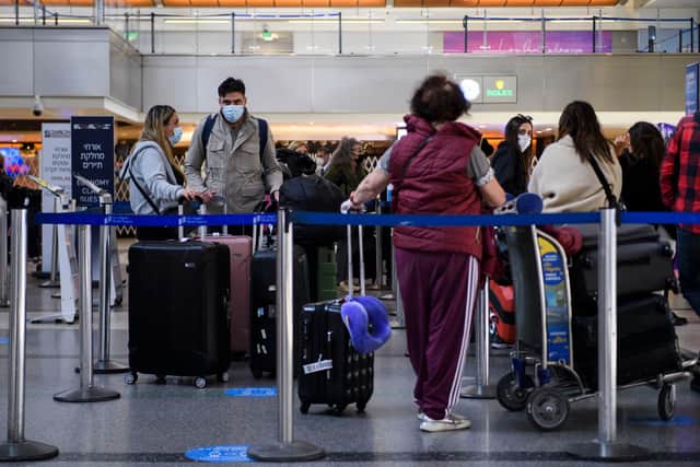 Thousands of British travellers rushed to return home from the United Arab Emirates (UAE) today before a flight ban came into force.