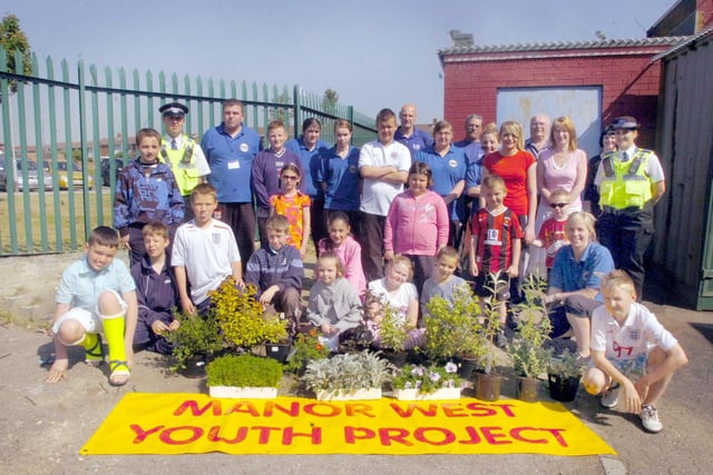 A 'Big Tidy' event at the Manor West Youth Project but were you pictured in 2009?
