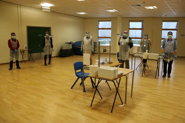 Staff at Meadowhead School working at the new mass testing centre.