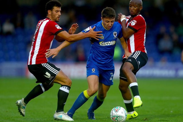 AFC Wimbledon's Anthony Hartigan has been linked with moves to Bolton Wanderers and Hull City recently, but Dons boss Mark Robinson has insisted that the club will act ‘quickly’ to tie-down the 21 year-old whose contract runs out in the summer (London News Online). (Photo by Clive Rose/Getty Images)