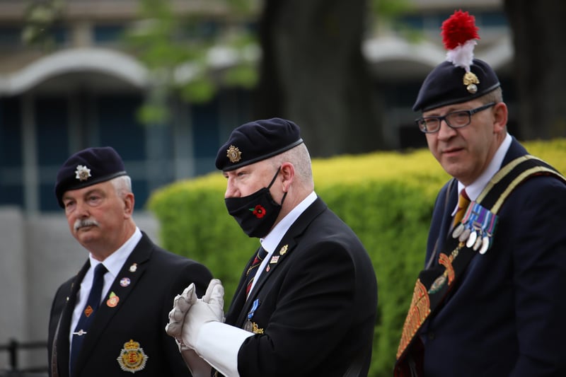 Three former members of the armed forces at the Sunday anniversary.