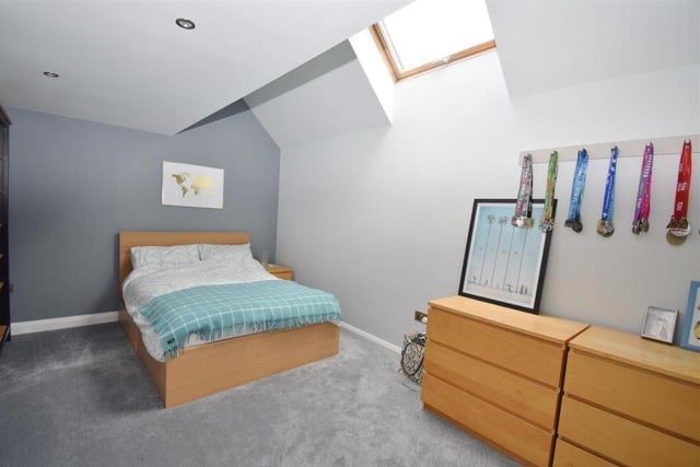 The second double bedroom boasts a vaulted ceiling, an upright radiator and a Velux window. You can also get to the loft space from this room.