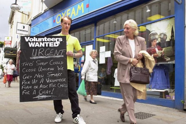 Chris Gaylor, manager of the Oxfam charity shop in 2001 looking for new volunteers.