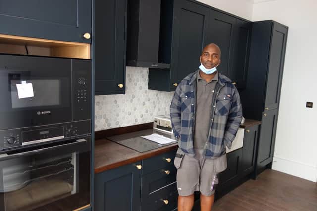 Efe Omu in a kitchen in the former Cannon pub on Castle Street which he is turning into flats.