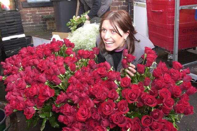 Pictured at  Katie Peckitt's flower shop, Ecclesall Road in 2001, where  staff are at full stretch preparing for Valentine's day. Seen is  Julie Woodhams the manageress with some of the many red roses that will be given on Valentines Day