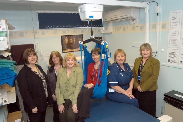 In 2007 Sandra Bird, third left, and Faith Humphries, right, of the Mansfield and Sutton League of Hospital Friends, presented a specialist hoist to Mansfield Community Hospital. Receiving the equipment from the left were; Sally Marsh, Clinical Services Manager (Modern Matron), Jane Bolus, Osteoperosis Nurse Specialist, Sheila Eyley, Voluntery Services Co-ordinator, and Ann Potter Otseoperosis Senior Nurse.
