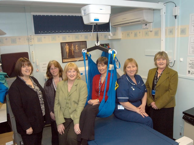 In 2007 Sandra Bird, third left, and Faith Humphries, right, of the Mansfield and Sutton League of Hospital Friends, presented a specialist hoist to Mansfield Community Hospital. Receiving the equipment from the left were; Sally Marsh, Clinical Services Manager (Modern Matron), Jane Bolus, Osteoperosis Nurse Specialist, Sheila Eyley, Voluntery Services Co-ordinator, and Ann Potter Otseoperosis Senior Nurse.