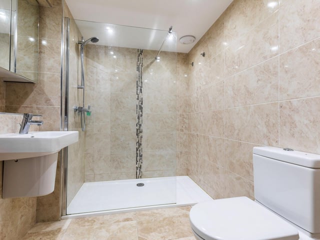 There are three bathrooms in the property