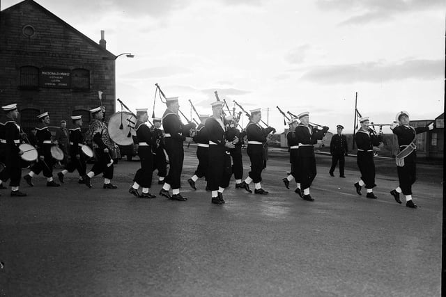 The HMS Claverhouse pipe band marches back to the training centre at Granton in 1962.