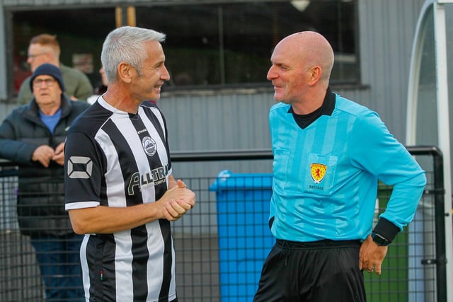 Davie Irons with a match official