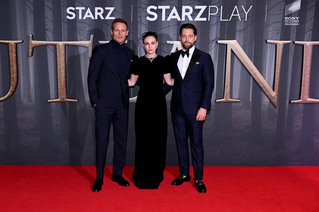 Sam Heughan, Sophie Skelton and Richard Rankin (Jamie, Brianna, and Roger) attend the Outlander Season six premiere in London.