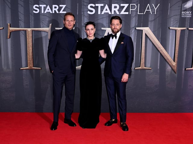 Sam Heughan, Sophie Skelton and Richard Rankin (Jamie, Brianna, and Roger) attend the Outlander Season six premiere in London.