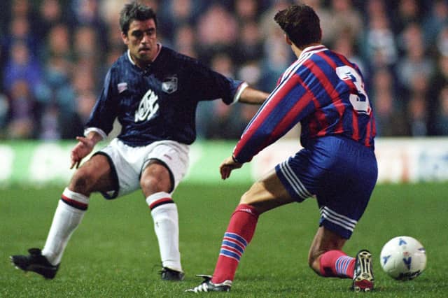 Bayern Munich's Christian Ziege, right, struggles to keep his balance in October 1995's UEFA Cup Winners' Cup second round game against Raith Rovers at Easter Road in Edinburgh. Photo: SNS Group
