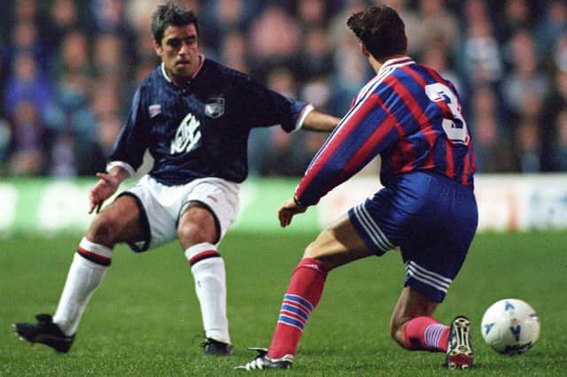 Bayern Munich's Christian Ziege, right, struggles to keep his balance  in October 1995's UEFA Cup Winners' Cup second round game against Raith Rovers at Easter Road in Edinburgh. Photo: SNS Group