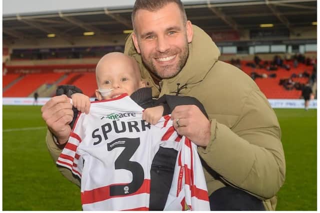 Tommy Spurr with his son Rio. (Photo: Doncaster Rovers FC).