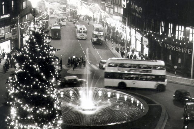 A view of the illuminations on Fargate, Sheffield, with the Goodwin Fountain in the foreground, 1961
