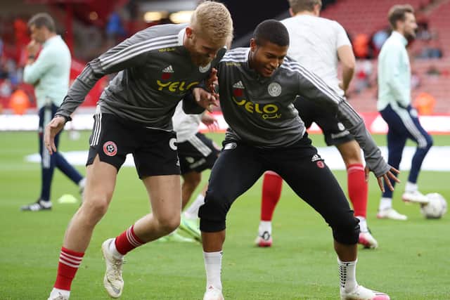Rhian Brewster warms-up with his Sheffield United team mate Oli McBurnie: Simon Bellis / Sportimage