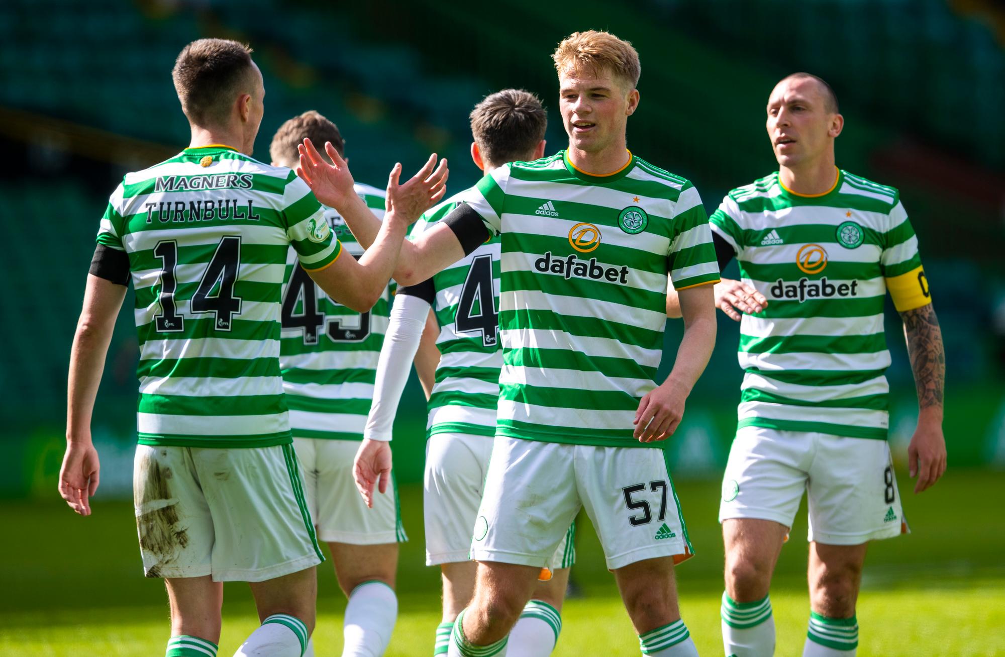 GLASGOW, SCOTLAND - APRIL 10:  David Turnbull celebrates with Stephen Welsh after scoring to make it 2-0 during the Scottish Premiership match between Celtic and Livingston at Celtic Park, on April 10, 2021, in Glasgow, Scotland. (Photo by Craig Foy / SNS Group)