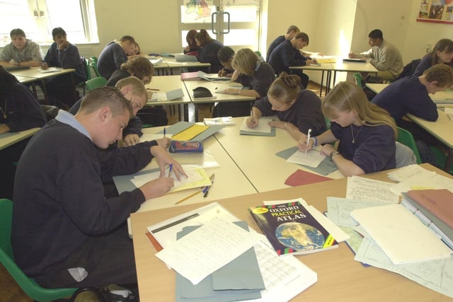 Pupils in classroom F30, year 11 geography, busy with their work following the move to Firth Park School's new single site campus in 2000.