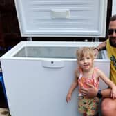 Carl and Felicity with the ice bath in their garden. 