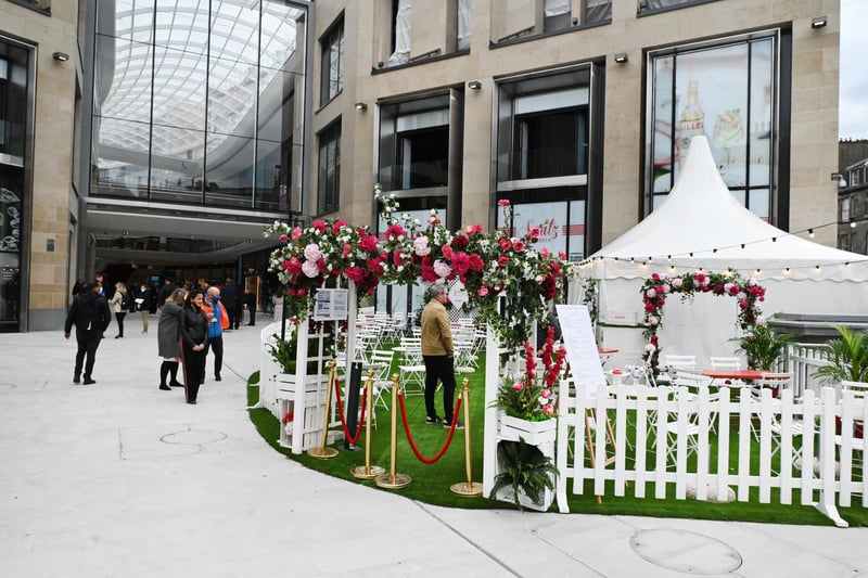 The Lillet Spritz Garden is outside St James for the summer for shoppers and others to enjoy a cocktail with a beautiful floral arch -  perfect for Instagram posts.