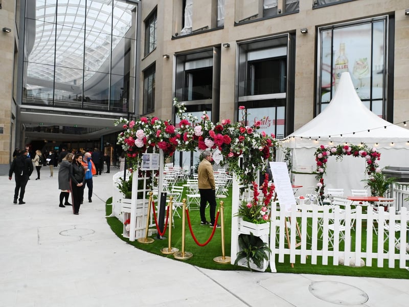 The Lillet Spritz Garden is outside St James for the summer for shoppers and others to enjoy a cocktail with a beautiful floral arch -  perfect for Instagram posts.