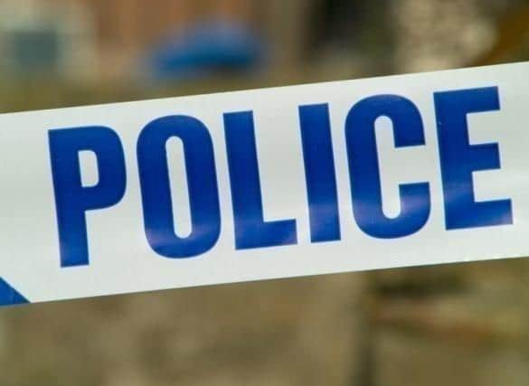 Police reported that a vehicle was in collision with a crowd of people and caused damage to a building, before leaving the scene.