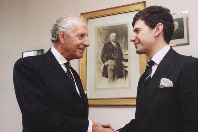 Michael Frampton with his son Jimmy, who succeeded him as managing director of the family jewellery firm H.L. Brown