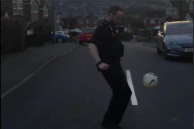 Police officers played football in deserted streets in Sheffield to demonstrate how lockdown rules are being adhered to.