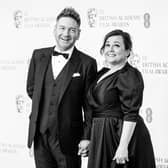 Kenneth Branagh and Lindsay Brunnock attend the EE British Academy Film Awards 2022 at Royal Albert Hall on March 13, 2022 in London, England. (Photo by Tristan Fewings/Getty Images)