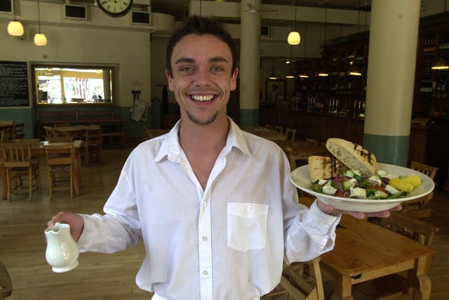 Anthony Ducker serves up a Greek salad with olive and crusty white bread at All Bar One, Sheffield in 2002