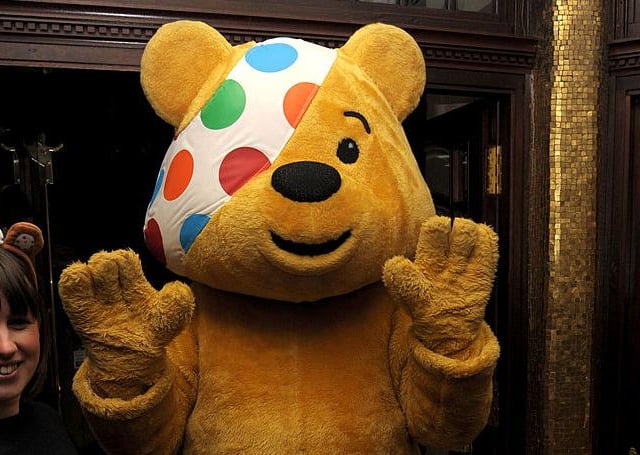 In 2007, aged 22, the famous bear got an updated look. The BBC Children in Need logo was updated once again, giving Pudsey a more colourful bandana featuring different coloured spots on a white background. This is the version of Pudsey still used today, pictured here in 2011 (Photo: Ben Pruchnie/Getty Images)