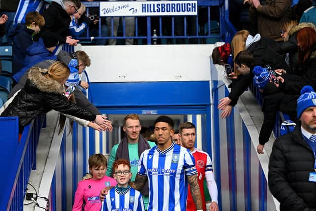 Liam Palmer of Sheffield Wednesday leads his team out onto the pitch. (Photo by Clive Mason/Getty Images)